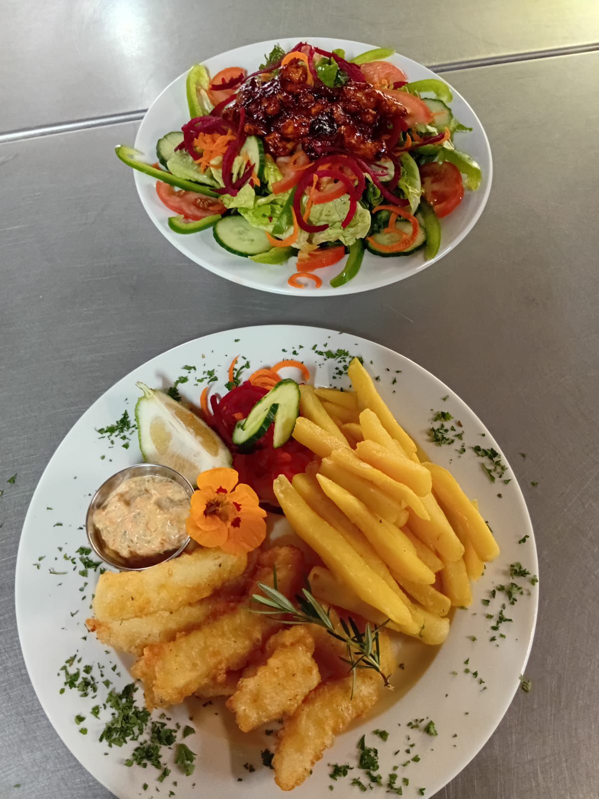 Fish sticks and chips with salad